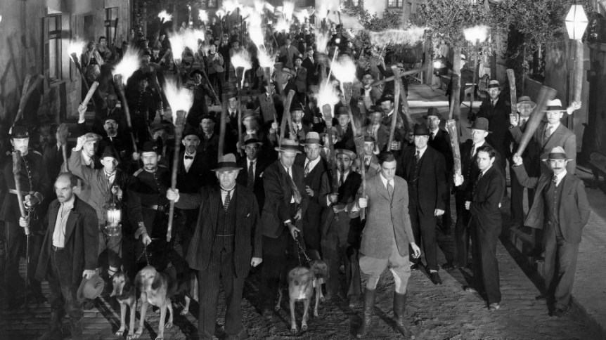 Colin Clive (in jodhpurs), Amongst Crowd with Torches and Clubs, on-set of the Film, ''Frankenstein'', 1931